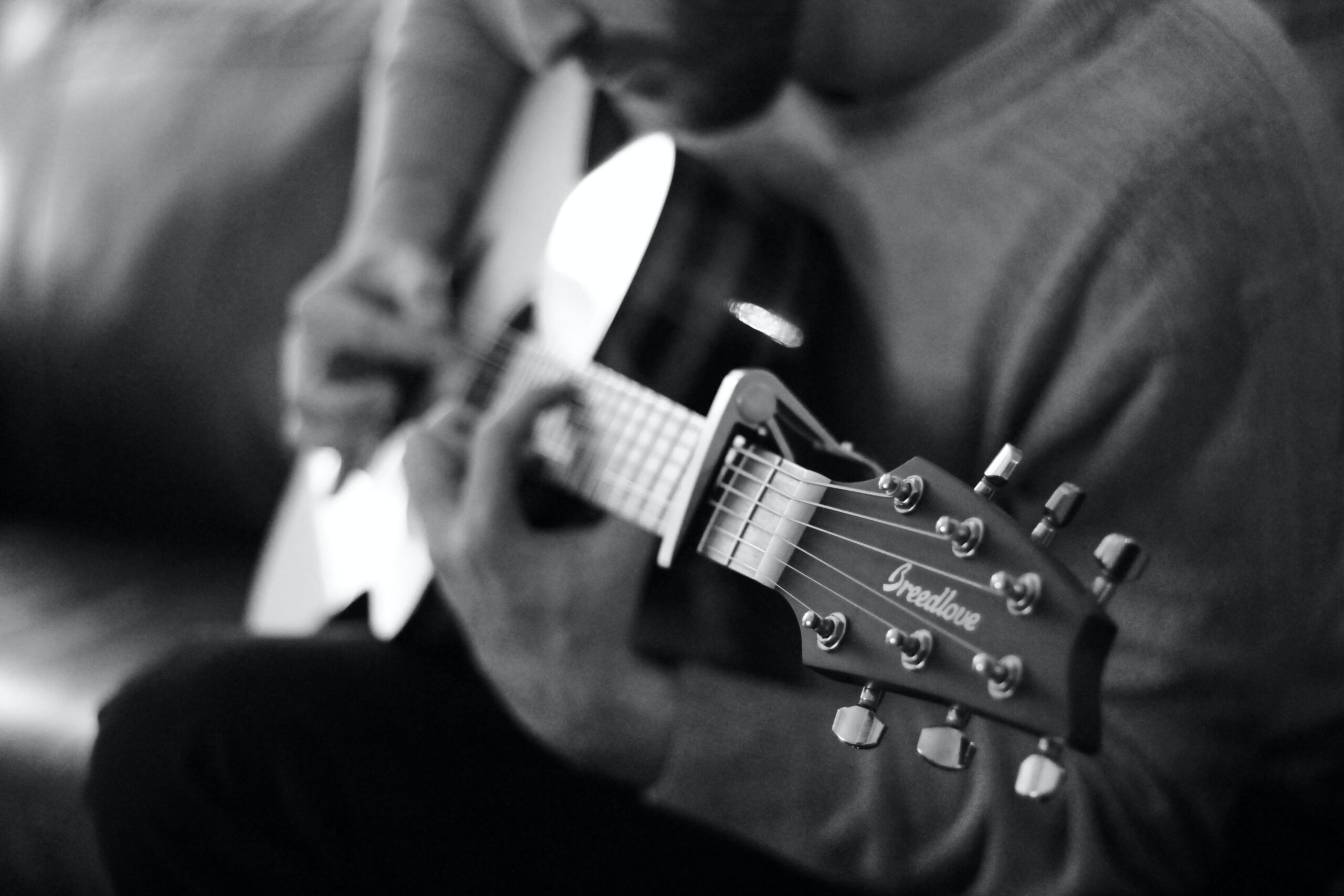 Man playing acoustic guitar